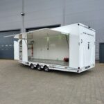 Przyczepa ciężarowa trzyosiowa zamknięty kontener enclosed trailer transporter furgon Ta-No SPORT TRANSPORTER PREMIUM DMC 3500kg uchylna niski kąt do przewozu sportowych samochodów