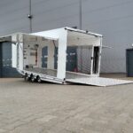 Przyczepa ciężarowa trzyosiowa zamknięty kontener enclosed trailer transporter furgon Ta-No SPORT TRANSPORTER PREMIUM DMC 3500kg uchylna niski kąt do przewozu sportowych samochodów